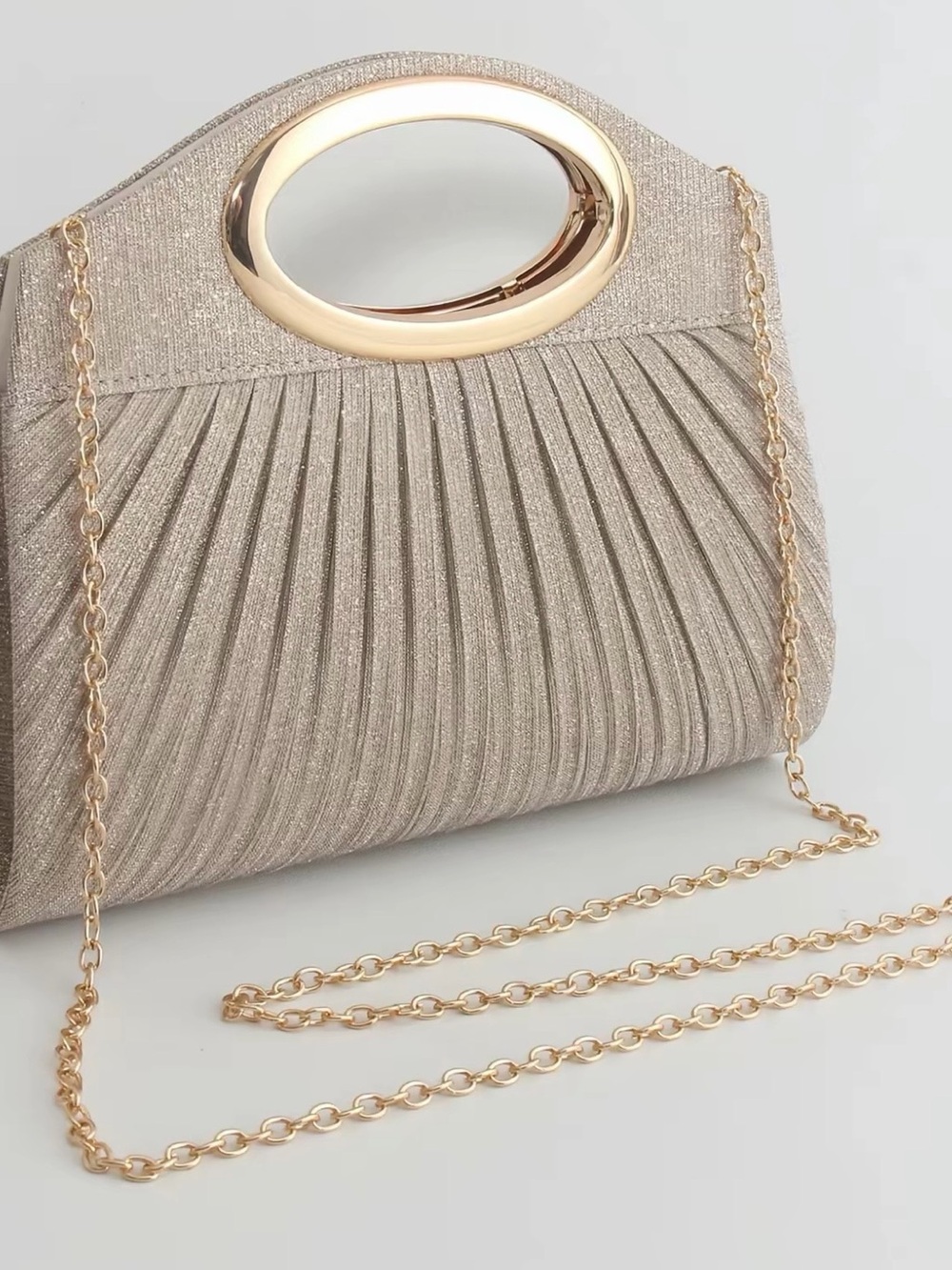 Shimmery Gold Pleated Evening Clutch with Oval Handle